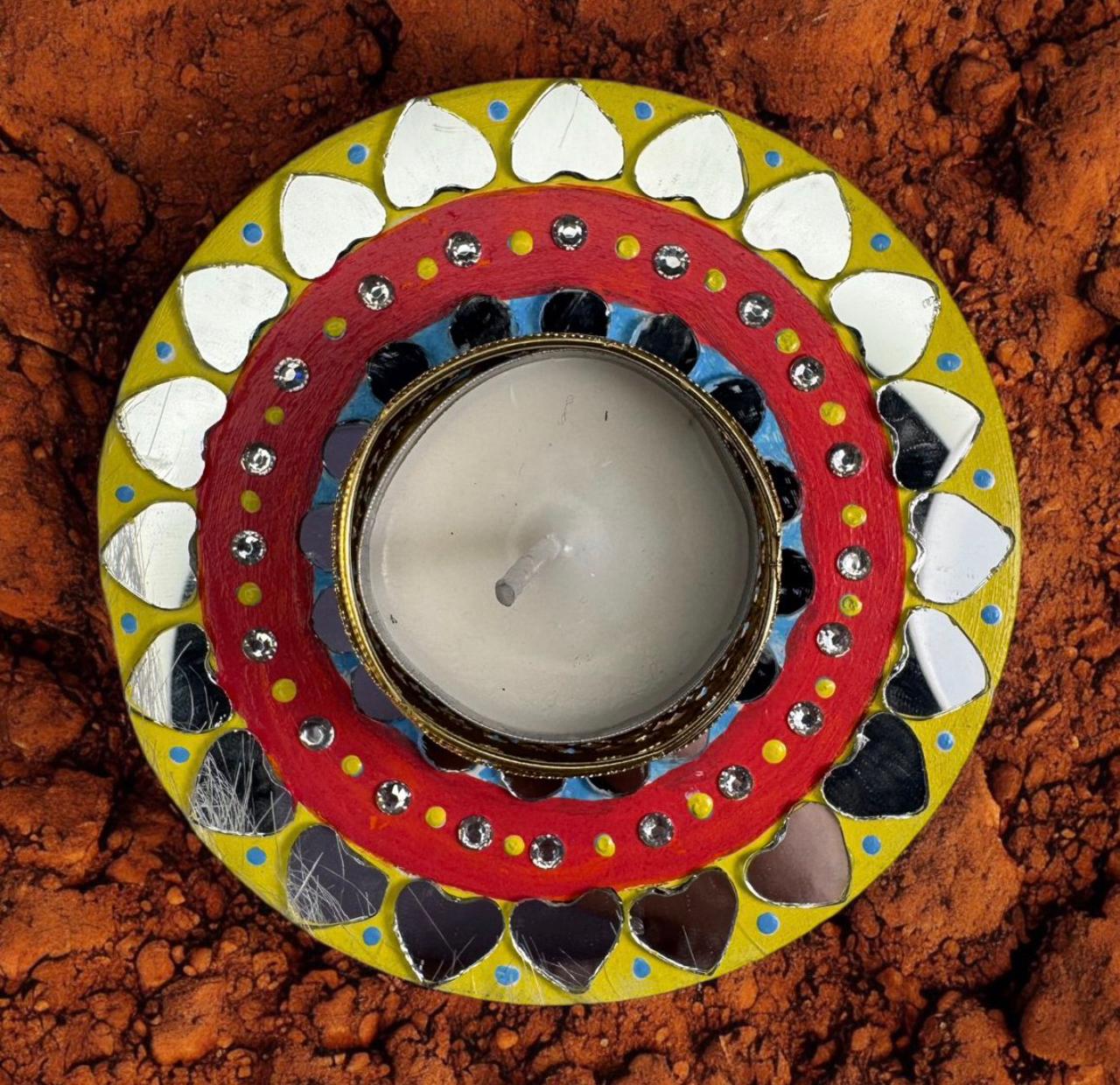 Handcrafted rangoli mirror tealight holder with colorful design and decorative embellishments for Diwali décor